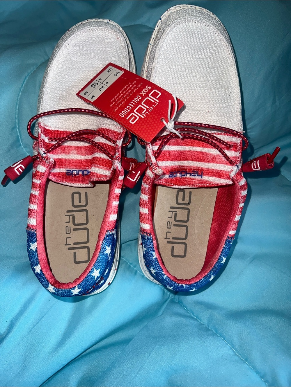 Hey Dude womenâs Slip-On Sneakers in Red, White & Blue Stars